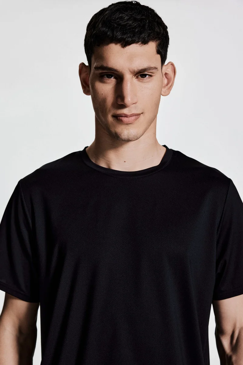 اتش اند ام بلوزة رياضية بقصة عادية من نسيج دراي موف™